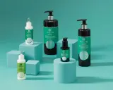 Produkty Basiclab do pielęgnacji skóry tłustej: płyn micelarny, żel oczyszczający i serum.