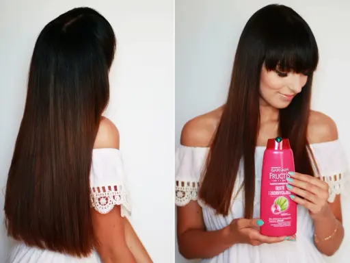 Długie włosy kobiety lśnią dzięki szamponowi Garnier Fructis.